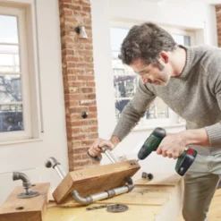 Bosch 18V Klopboormachine UniversalImpact (Incl. 2 Accu's 1.5Ah + Lader) -SKIL WINKEL 123 170